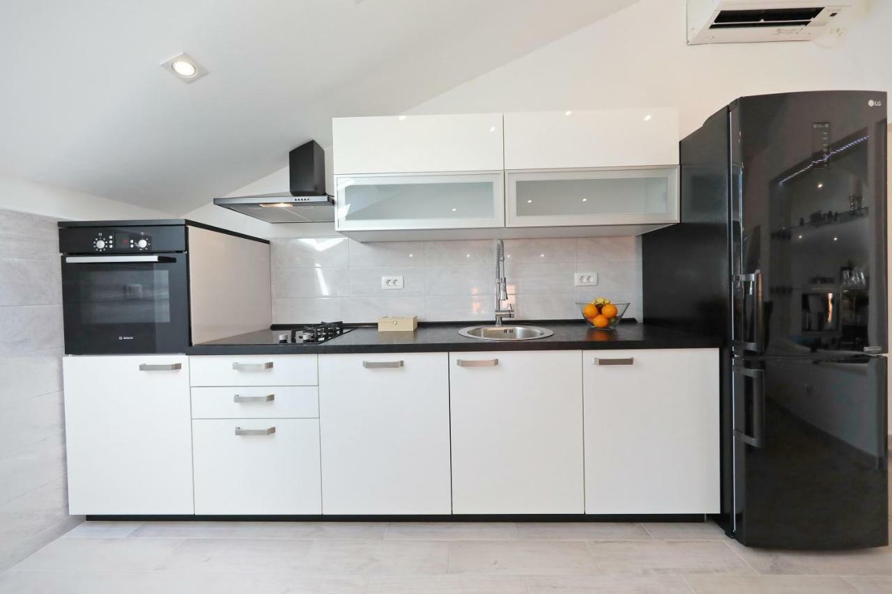 Zara Three Wells Apartment Luaran gambar
